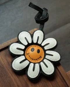 smile flower bag charm, leather smile flower keychain, handmade flower bag charm, smiley bag accessory, graphic leather keychain, car key accessory
