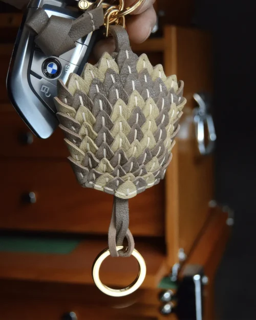 leather scale flower bag charm, snakeskin texture flower keychain, handmade leather flower accessory, layered floral bag charm, sculptural leather keychain