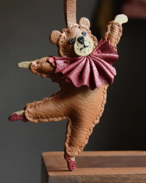 trendy cartoon bag charm,cartoon leather keychain,handmade cartoon leather charm,cartoon bag accessory,car key accessory leather,abstract cartoon charm,ballet style bag charm,handcrafted leather accessory,designer bag charm,leather keychain cartoon