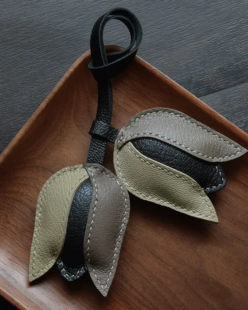 Tulip Bag Charm handcrafted from French goatskin leather, hand-stitched over three days and gift boxed for bags, keys, and car key accessories.