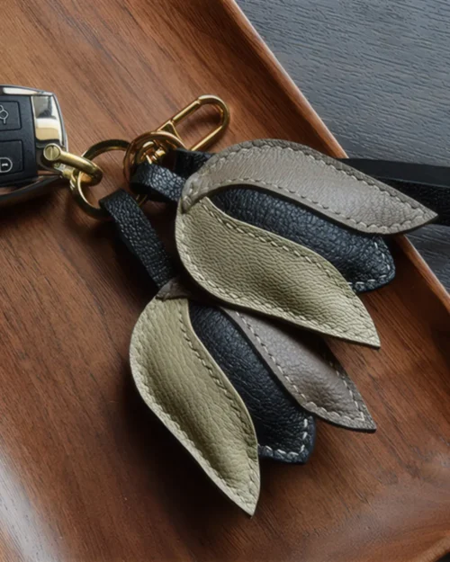 Tulip Bag Charm handcrafted from French goatskin leather, hand-stitched over three days and gift boxed for bags, keys, and car key accessories.