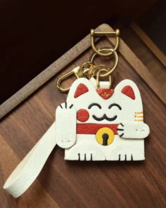 leather lucky cat bag charm, lucky cat leather keychain, handmade lucky cat charm, fortune cat bag accessory, leather lucky symbol keychain