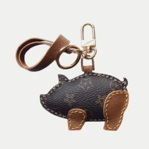 Wild boar bag charm handcrafted from premium leather, hand-stitched over three days and gift boxed for bags, keys, or car key accessories.