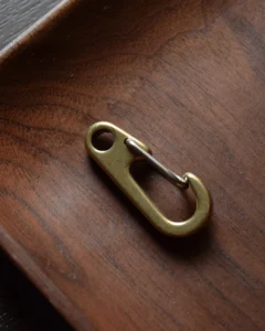 Keychain accessory components set featuring brass hardware, leather tassels, cords, and connectors for bag charms, keychains, and car key accessories.