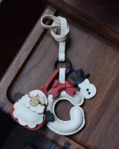 A festive letter bag charm handcrafted from French goatskin leather. Choose from 26 letters and create custom combinations, hand-stitched and gift boxed.