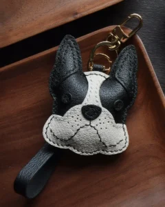Dog Bag Charm handcrafted from French goatskin leather, hand-stitched over three days and gift boxed for bags, keys, and car key accessories.