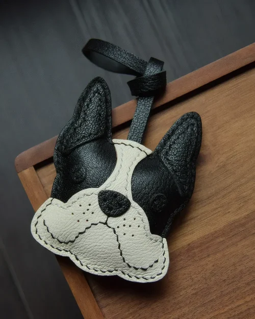 Dog Bag Charm handcrafted from French goatskin leather, hand-stitched over three days and gift boxed for bags, keys, and car key accessories.