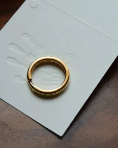 Keychain accessory components set featuring brass hardware, leather tassels, cords, and connectors for bag charms, keychains, and car key accessories.