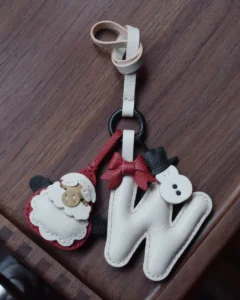 A festive letter bag charm handcrafted from French goatskin leather. Choose from 26 letters and create custom combinations, hand-stitched and gift boxed.