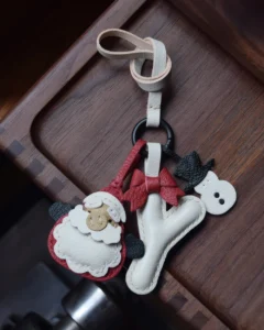 A festive letter bag charm handcrafted from French goatskin leather. Choose from 26 letters and create custom combinations, hand-stitched and gift boxed.